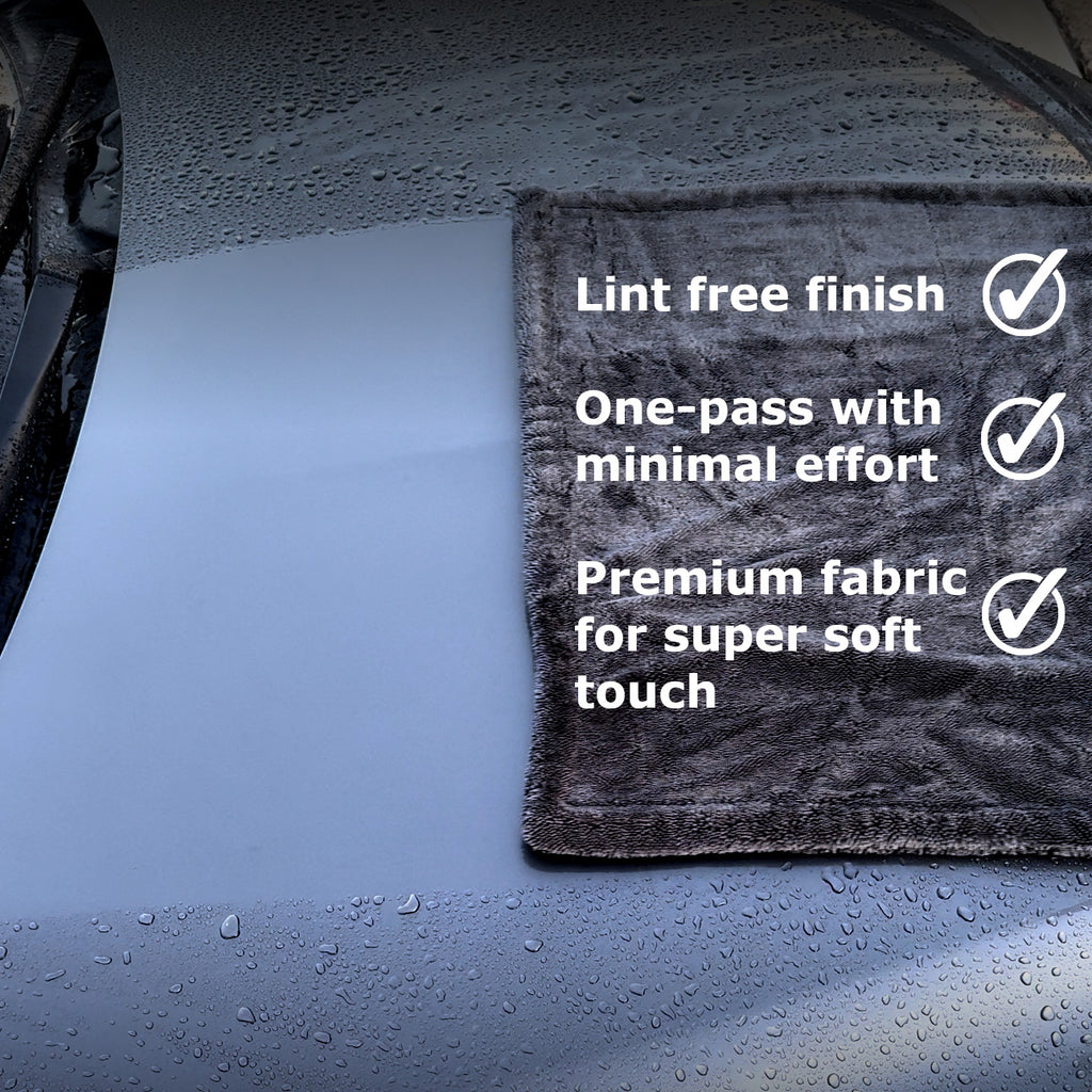 gray microfiber towel on gray car. streak-free, scratch-free, lint-free finishes. one-pass with minimal effort and premium fabric for super soft touch.